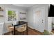 Charming dining area featuring a window for natural light and a stylish table set at 13 H St, Charleston, SC 29403