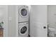 Efficient laundry area with stackable washer and dryer, maximizing space in the home at 13 H St, Charleston, SC 29403