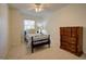 Cozy bedroom featuring a comfortable bed, dresser, and a bright window at 1307 Ventura Pl, Mount Pleasant, SC 29464
