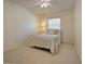 Cozy bedroom with carpet, ceiling fan and natural light streaming through the window creates a relaxing space at 1307 Ventura Pl, Mount Pleasant, SC 29464