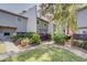 Well-maintained townhouse with green lawn, mature trees, and tasteful landscaping at 1307 Ventura Pl, Mount Pleasant, SC 29464