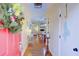 The inviting foyer flows into an open-plan living space, showcasing hardwood floors and natural light at 1307 Ventura Pl, Mount Pleasant, SC 29464