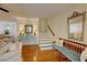 Inviting living room showing hardwood floors, staircase, and stylish furnishings at 1307 Ventura Pl, Mount Pleasant, SC 29464
