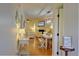 Sun-filled living and dining area with stylish decor, modern lighting, and hardwood floors at 1307 Ventura Pl, Mount Pleasant, SC 29464