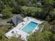 Aerial view of the community pool featuring lounge chairs and nearby waterway at 1307 Ventura Pl, Mount Pleasant, SC 29464
