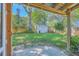 Charming backyard featuring a storage shed, lush green lawn, wooden fence, and mature trees at 1315 Old Mill Ln, Mount Pleasant, SC 29464