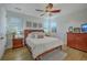 Cozy bedroom with a comfortable queen-sized bed, ceiling fan and two windows for natural light at 1315 Old Mill Ln, Mount Pleasant, SC 29464