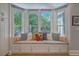 Charming breakfast nook with large bay windows and a comfortable bench seat at 1315 Old Mill Ln, Mount Pleasant, SC 29464