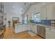 Modern kitchen with marble countertops, stainless steel appliances and plenty of natural light at 1315 Old Mill Ln, Mount Pleasant, SC 29464