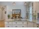Bright kitchen with granite countertops and stainless appliances, open to the dining area at 1315 Old Mill Ln, Mount Pleasant, SC 29464