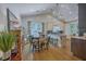 Charming eat-in kitchen boasts an island, pendant lighting, and a sunlit breakfast nook at 1315 Old Mill Ln, Mount Pleasant, SC 29464