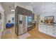 Modern kitchen with stainless steel appliances and sleek black cabinetry in an open floor plan at 1315 Old Mill Ln, Mount Pleasant, SC 29464