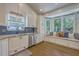 Bright, modern kitchen with stainless steel appliances, granite countertops, and a breakfast nook at 1315 Old Mill Ln, Mount Pleasant, SC 29464