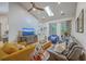 Open living room featuring vaulted ceilings, skylight, stylish decor and plenty of natural light at 1315 Old Mill Ln, Mount Pleasant, SC 29464