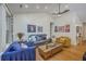 Comfortable living room features stylish furniture, wood floors and vaulted ceilings at 1315 Old Mill Ln, Mount Pleasant, SC 29464