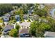 An aerial view of a lovely home situated on a quiet cul-de-sac with manicured lawns and mature trees at 1339 River Otter Court, Mount Pleasant, SC 29466