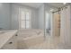 Bathroom features a large tub and shower at 1339 River Otter Court, Mount Pleasant, SC 29466