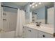 Bathroom featuring a tub and shower, white vanity, and updated fixtures at 1339 River Otter Court, Mount Pleasant, SC 29466