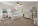 Bright bedroom with a white bunk bed, plush carpet, and plenty of natural light at 1339 River Otter Court, Mount Pleasant, SC 29466