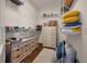 Large walk-in closet with shelves and built-in storage solutions at 1339 River Otter Court, Mount Pleasant, SC 29466