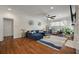 Bright living room with hardwood floors, comfortable seating, and natural light at 1339 River Otter Court, Mount Pleasant, SC 29466