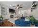 Inviting living room features a fireplace, built-in shelving, and hardwood floors at 1339 River Otter Court, Mount Pleasant, SC 29466