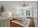 Serene main bedroom features hardwood floors, natural light, neutral tones, and ample closet space for a calm retreat at 1339 River Otter Court, Mount Pleasant, SC 29466