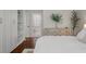 Bright bedroom features ensuite bathroom and storage cabinets at 1339 River Otter Court, Mount Pleasant, SC 29466