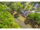 Aerial shot showcasing a home bordering a picturesque pond, enhancing its appeal with natural beauty and privacy at 134 Comiskey Park Cir, Summerville, SC 29485