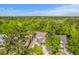 Aerial view of house surrounded by lush green trees at 134 Comiskey Park Cir, Summerville, SC 29485