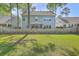 Fenced backyard with a view of the screened in porch at 134 Comiskey Park Cir, Summerville, SC 29485