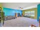 Spacious bedroom boasts vibrant accent walls, lots of natural light, and plenty of room at 134 Comiskey Park Cir, Summerville, SC 29485