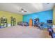 Bright bedroom with bold accent walls, providing a spacious and versatile living area at 134 Comiskey Park Cir, Summerville, SC 29485