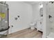 New bathroom with tiled shower, modern vanity, and hardwood floors at 1387 W Lenevar Dr, Charleston, SC 29407