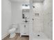Renovated bathroom with a tiled shower, modern vanity, and fixtures at 1387 W Lenevar Dr, Charleston, SC 29407