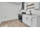 Contemporary kitchen with stainless steel oven and black hardware at 1387 W Lenevar Dr, Charleston, SC 29407