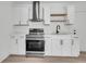New kitchen with white cabinetry, stainless steel appliances, and modern finishes at 1387 W Lenevar Dr, Charleston, SC 29407