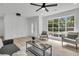 Bright living room with ample natural light, stylish decor, and an inviting atmosphere at 1387 W Lenevar Dr, Charleston, SC 29407