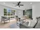 Contemporary living room featuring modern furnishings and a large window at 1387 W Lenevar Dr, Charleston, SC 29407