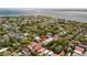 Aerial view of a neighborhood near the coast, showing residential buildings and green vegetation at 139 Tradd St # 2, Charleston, SC 29401