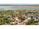 Aerial view of a neighborhood near the coast, showing residential buildings and green vegetation at 139 Tradd St # 2, Charleston, SC 29401