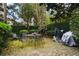 Secluded backyard featuring a brick patio and verdant garden creating a tranquil outdoor space at 139 Tradd St # 2, Charleston, SC 29401