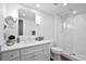 Modern bathroom features a glass shower, vanity with sink, and tiled walls at 139 Tradd St # 2, Charleston, SC 29401