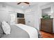 Bedroom with built-in storage, ceiling fan, and two dressers at 139 Tradd St # 2, Charleston, SC 29401