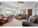 Inviting living room featuring a bay window, hardwood floors, neutral paint, and stylish furnishings at 139 Tradd St # 2, Charleston, SC 29401