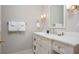 Well-lit bathroom with white marble countertop, stylish vanity, and elegant lighting fixtures at 14 Royal Beach Dr, Kiawah Island, SC 29455