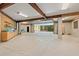 Spacious two-car garage with exposed beams and concrete floors at 14 Royal Beach Dr, Kiawah Island, SC 29455