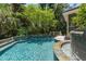 Gorgeous swimming pool with stone accents and secluded landscaping at 14 Royal Beach Dr, Kiawah Island, SC 29455