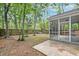 Outdoor view of a screened-in patio overlooking the backyard at 1453 Joy Ave, Charleston, SC 29407