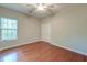 Bedroom featuring natural light, hardwood floors, ceiling fan and a closet at 1453 Joy Ave, Charleston, SC 29407